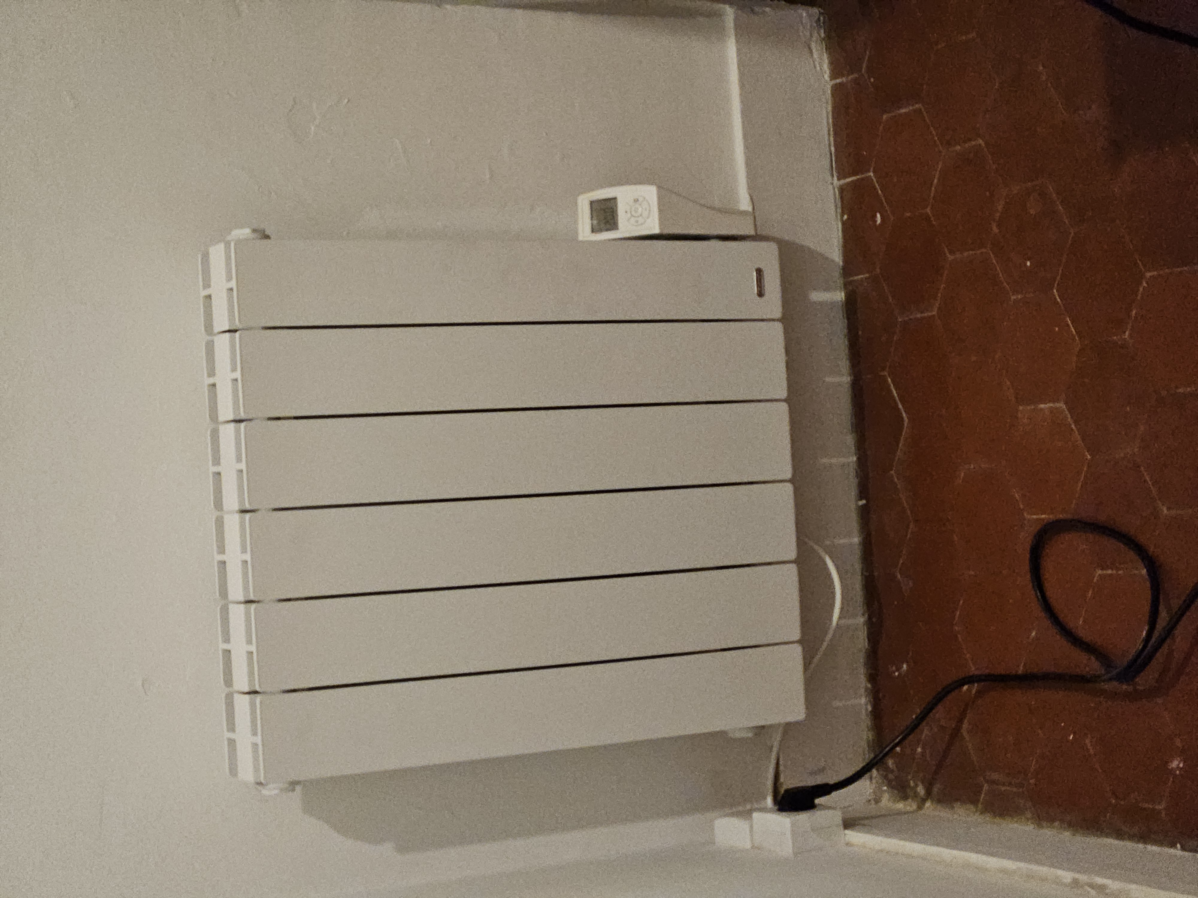 Installation de radiateurs à inertie sèche